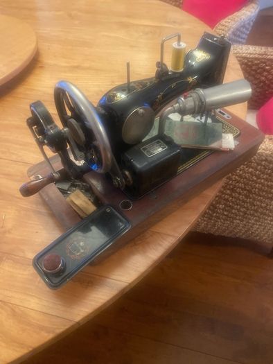 Old Vesta sowing machine with cover