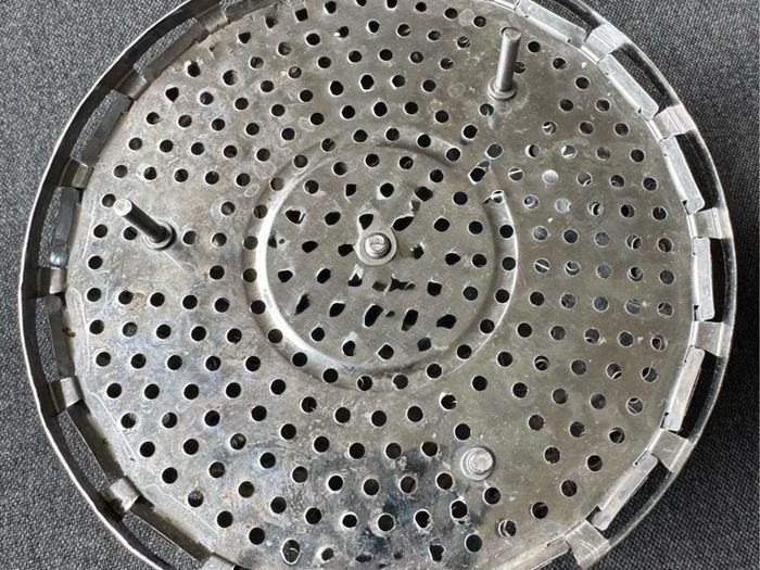 This is a collapsible stainless steel steamer basket