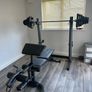 Home Gym Equipment: Adjustable Weider Gym Bench, Olympic bars, and Rubber Weights Image 5