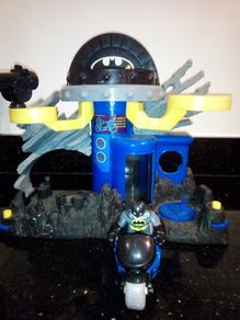 Batman cave,with Batman and  motorbike