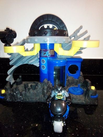 Batman cave,with Batman and  motorbike