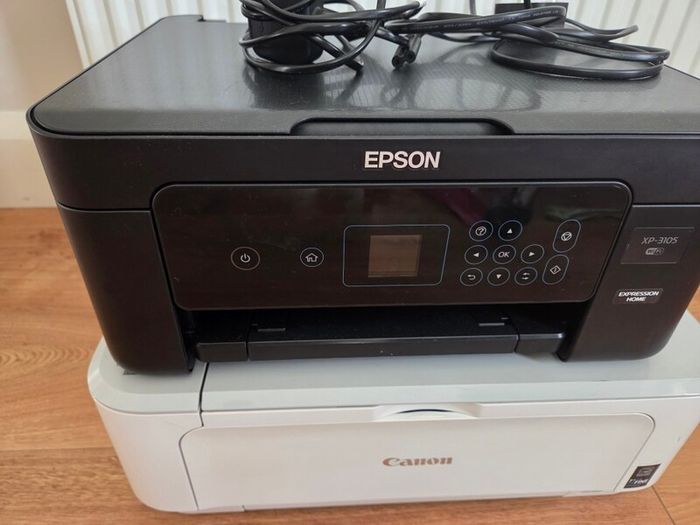 Canon and epson printer, not been used for a while, not sure working perfect