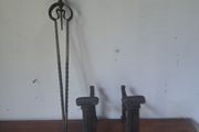 2 old iron stands and fire iron