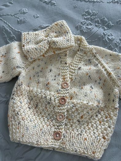 hand knitted baby blankets and cardigans
