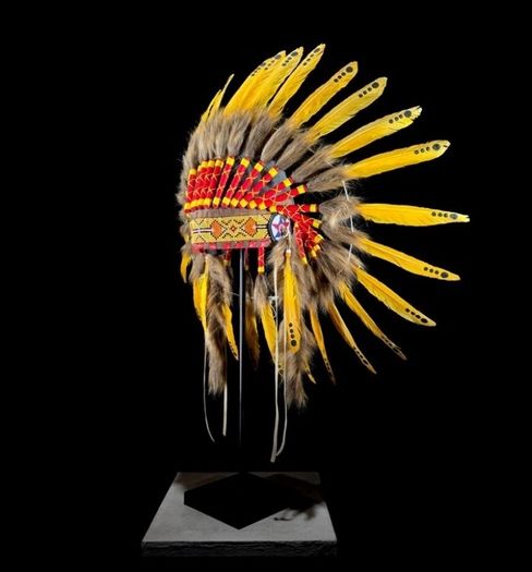 Large handmade Indian headdress on custom stand