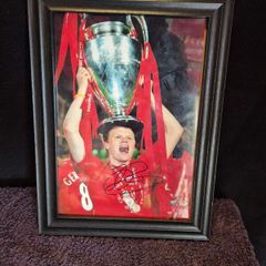 Liverpool signed photo 2005", "John Arne Riise autograph", "Istanbul 2005 memorabilia", and "Framed Liverpool FC with COA"