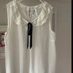 Sheer white size 12 top with frill and Peter Pan collar