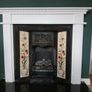 Fireplace in cast iron with wooden surround (painted white) and black marble hearth.   Perfect condition Image 6