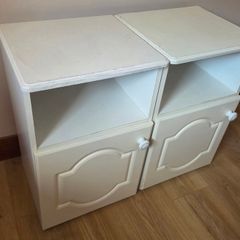White bedside tables