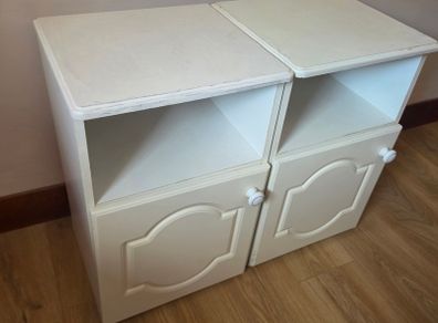 White bedside tables