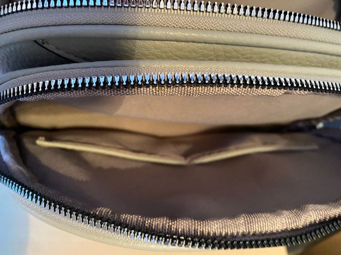 Grey leather effect backpack
