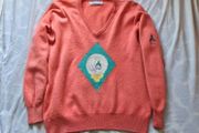 Pringle Scotland golf jumper Size large ptp 22" coral in good condition