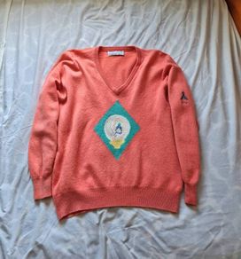 Pringle Scotland golf jumper Size large ptp 22" coral in good condition