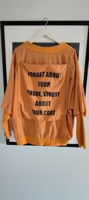 Slogan jumper, one size. L. 14-16