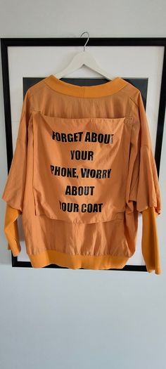 Slogan jumper, one size. L. 14-16