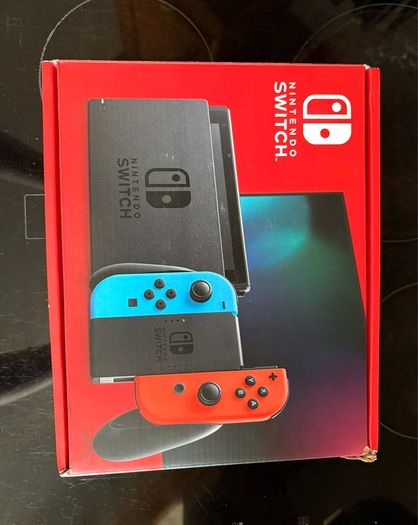 Nintendo Switch Neon Red/Blue with Improved Battery Life- Barely used
