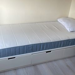 Single bed with storage drawers