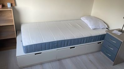 Single bed with storage drawers
