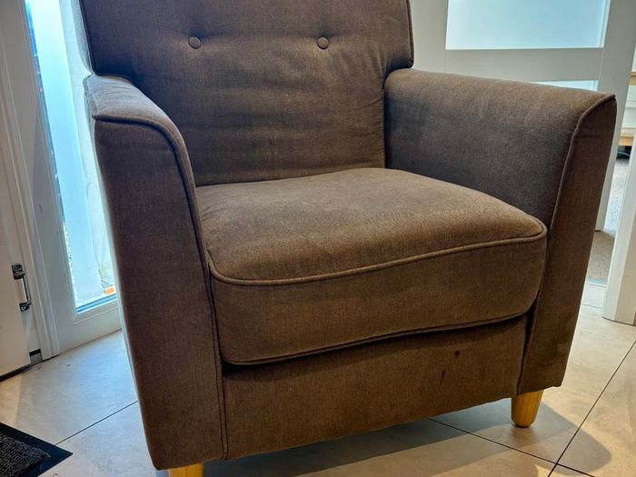 Grey fabric armchair