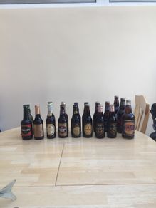 Selection Of Vintage Full Collectable Beer Bottles