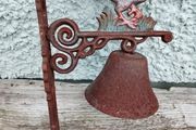 Charming rustic cast-iron rooster wall bell