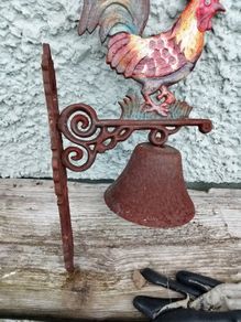 Charming rustic cast-iron rooster wall bell