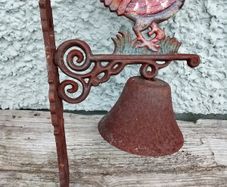 Charming rustic cast-iron rooster wall bell