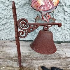 Charming rustic cast-iron rooster wall bell