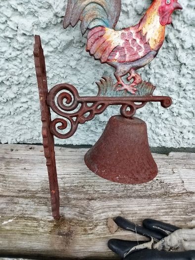 Charming rustic cast-iron rooster wall bell