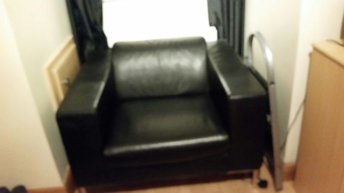 Large black leather armchair in perfect condition. Used only in bedroom.