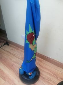 child's boxing bag and gloves