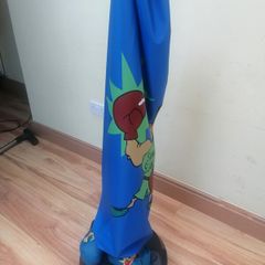 child's boxing bag and gloves