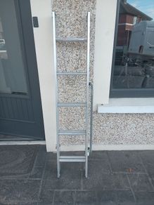 Two piece extendable ladder