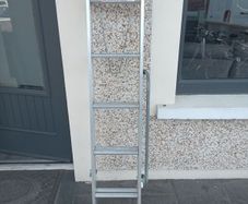 Two piece extendable ladder