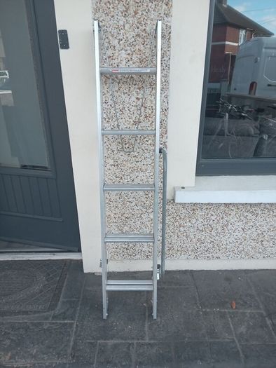 Two piece extendable ladder