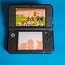 New 3DS XL Metallic Black with Games & Case Image 4