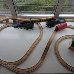 Wooden train tracks and trains