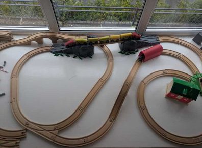 Wooden train tracks and trains
