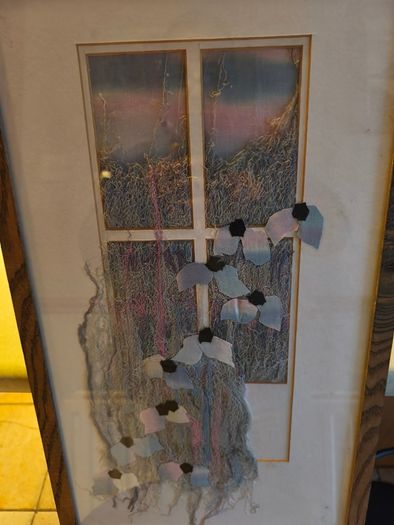 Lovely framed pictuer of modern art A print with added wool and flower's not signed.