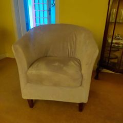 3 chairs with covers