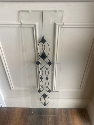 Two recliner chairs and 4 glass panels