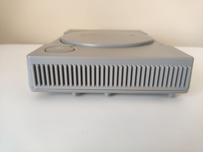 Playstation 1 console SCPH-7502 with games and cords