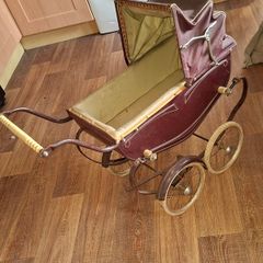 Antique Burgundy Doll's Pram, Manufactured by Walker around the 1940s, It features a Coach-Built Style Carriage with distinctive Wire-Spoke Wheels and Hard Rubber Tires Collection Only