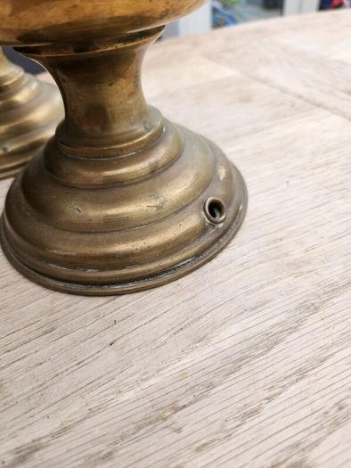 a lovely pair of old brass lamps