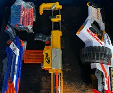 nerf guns and 50 plus bullets