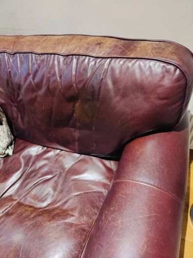 Brown leather sofa and arm chair