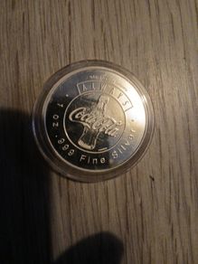 coke-cola 100% silver coin
