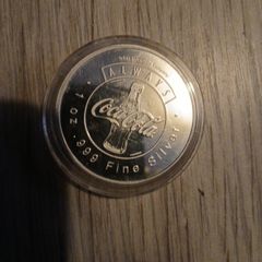 coke-cola 100% silver coin