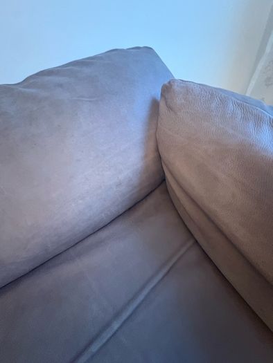 Leather sofa with original harvey Norman tag still attached