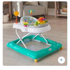 (Brand new still in box) baby walker